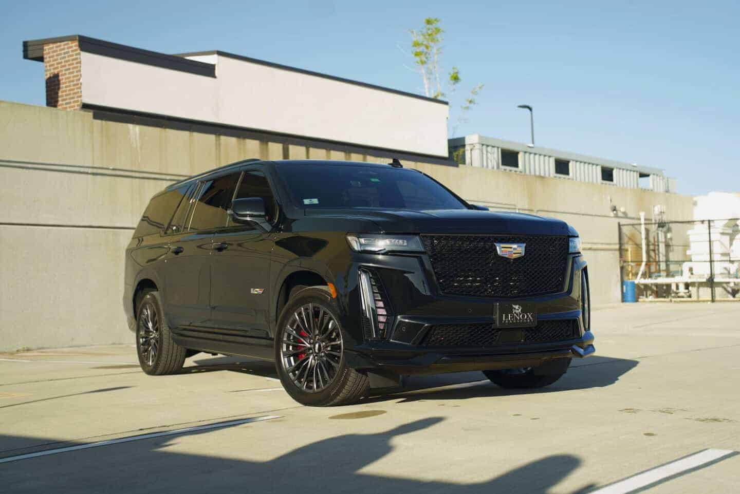 Cadillac luxury SUV on the road to Orlando International Airport