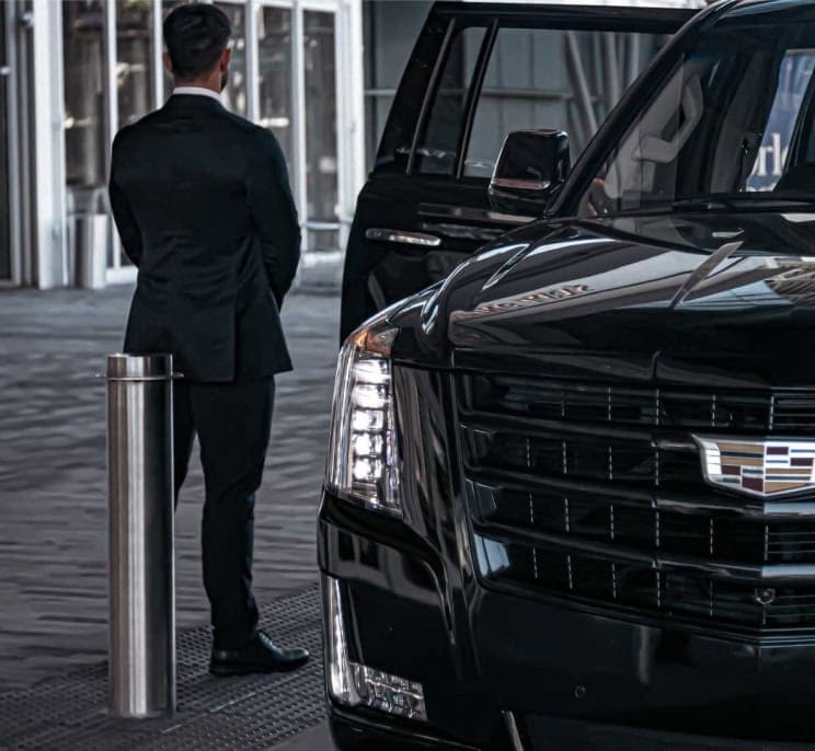 Lenox chauffeur opening the door for a client